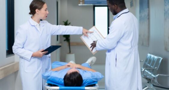 medical-professor-and-intern-looking-at-an-mri-of-2025-01-08-02-26-07-utc